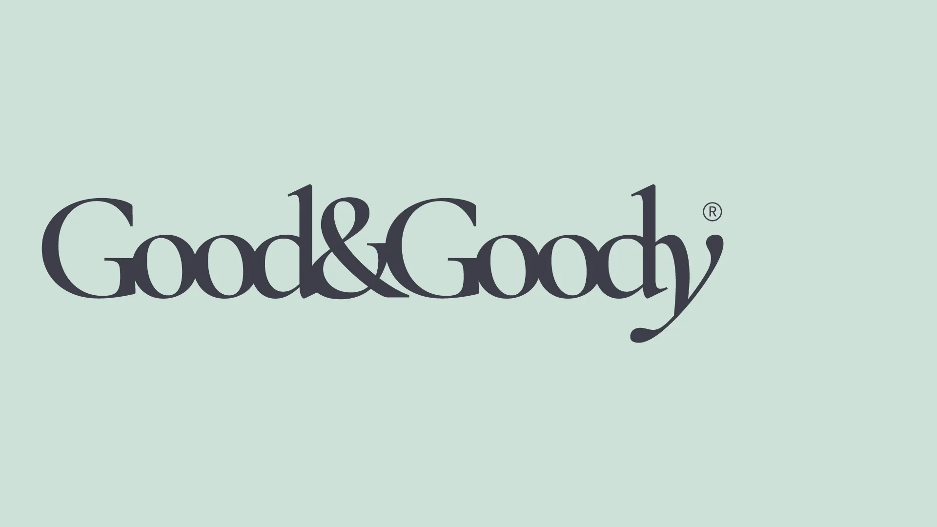 Good&Goody 브랜드의 핵심 아이덴티티를 담은 워드마크 로고입니다. 세련되고 친근한 브랜드 성격을 우아한 세리프 서체로 표현했습니다. 민트색 배경에 어두운 회색 세리프 서체로 쓰인 'Good&Goody' 워드마크 로고