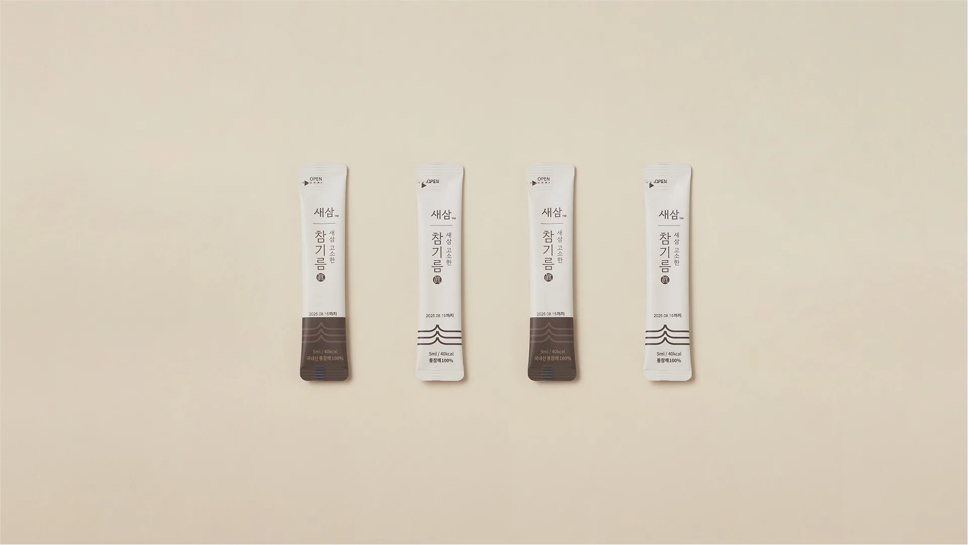 Premium individual packaging pouches for SESAM sesame oil, crafted with 25 years of expertise. Simple and refined design elevates everyday quality. Four elegantly designed individual sesame oil pouches from SESAM on a light beig